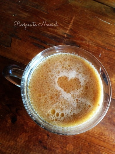 Mug of frothy hot chocolate.