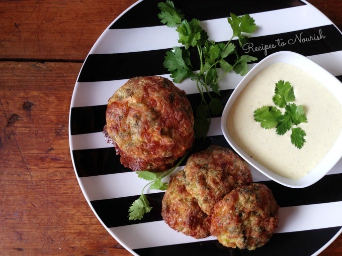 Broccoli fritters with a side of creamy dipping sauce. 
