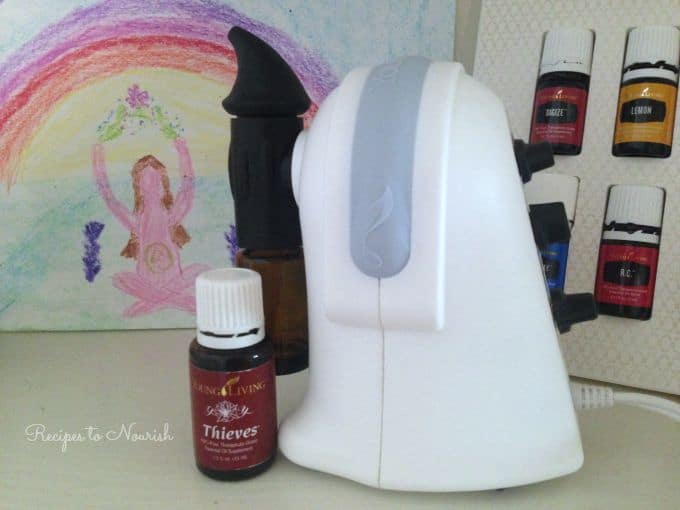 Essential oils diffuser, essential oils and art with a rainbow. 