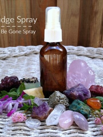 Essential oils spray bottle with crystals.