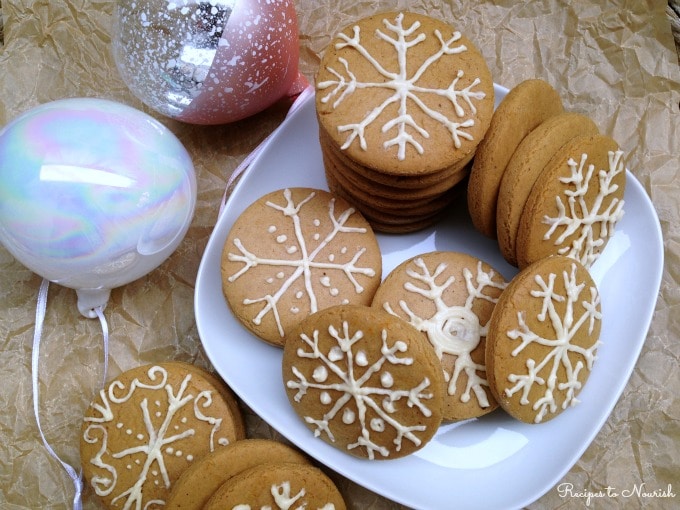 Gingerbread cookies frosted like snowflakes.