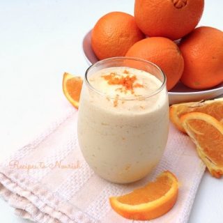 Orange creamsicle smoothie with fresh oranges.