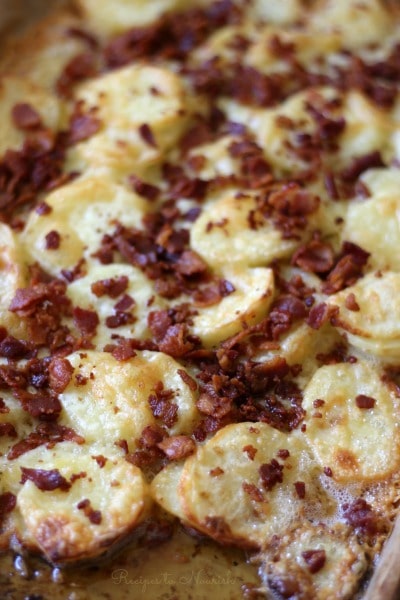 Scalloped potatoes baked with cheese and crispy bacon.