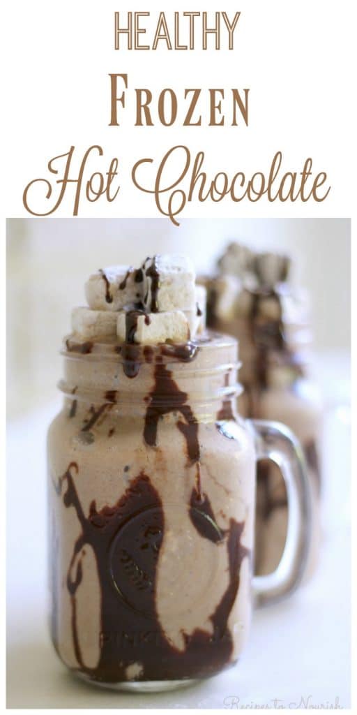 Frozen Hot Chocolate is a super fun treat on a hot summer day. Icy cold, chocolaty, creamy goodness mixed with healthy, whole food ingredients, topped with rich chocolate fudge sauce and homemade marshmallows is sure to please. | Recipes to Nourish 