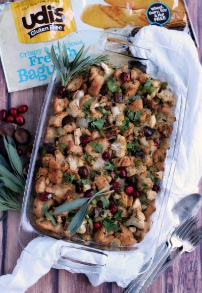 Stuffing in a casserole dish with cranberries, fresh sage and Udi's french baguettes. 