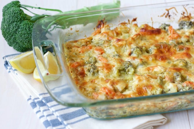 Cheesy chicken broccoli casserole with fresh broccoli and lemon.