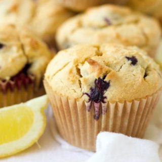 Grain free Blueberry Muffins are the perfect, protein-packed, on-the-go breakfast or afternoon snack. These delicious Paleo-friendly muffins are overflowing with blueberries and have a subtle buttery, lemon flavor. | Recipes to Nourish
