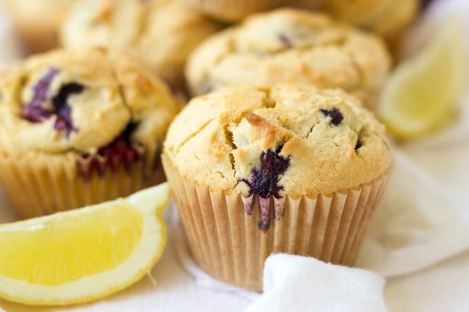 Blueberry muffins and fresh lemon slices. 