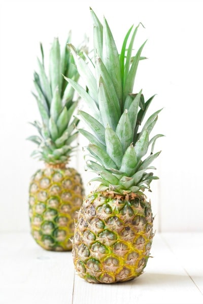 Two fresh pineapples. 