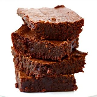 These decadent Fudgy Grain Free Brownies are out-of-this-world, crazy good. They're chewy with a nice crusty bite on top, made without refined sugar, naturally gluten free, Paleo-friendly and freeze beautifully too! You would never know these irresistible brownies are grain free. | Recipes to Nourish