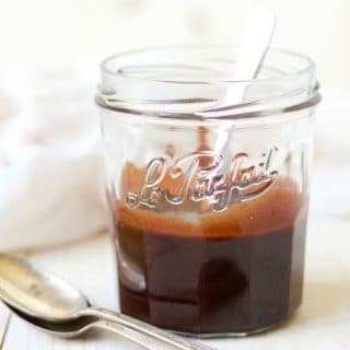 This Real Food Chocolate Fudge Sauce is so easy to make plus it's unbelievably delicious. Silky and rich, this heavenly chocolate fudge sauce is so much healthier than the store-bought stuff, and only takes 2 minutes to make! | Recipes to Nourish