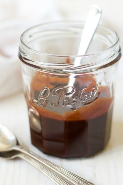 This Real Food Chocolate Fudge Sauce is so easy to make plus it's unbelievably delicious. Silky and rich, this heavenly chocolate fudge sauce is so much healthier than the store-bought stuff, and only takes 2 minutes to make! | Recipes to Nourish
