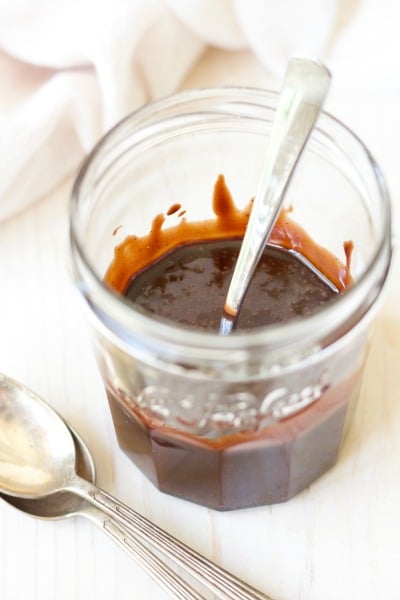 This Real Food Chocolate Fudge Sauce is so easy to make plus it's unbelievably delicious. Silky and rich, this heavenly chocolate fudge sauce is so much healthier than the store-bought stuff, and only takes 2 minutes to make! | Recipes to Nourish
