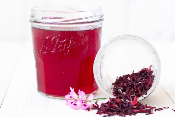 Hibiscus herbal tea and dried hibiscus blossoms.