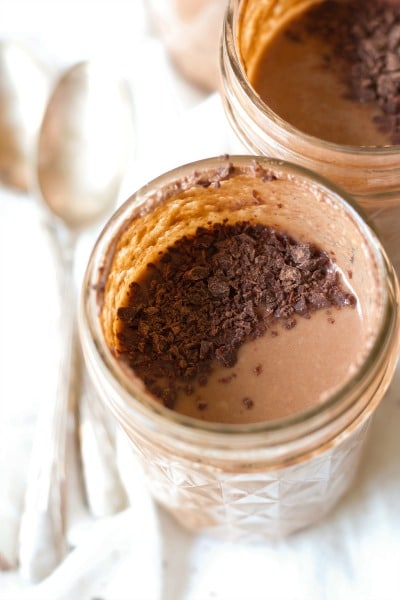 5 Minute Healthy Instant Pot Chocolate Pudding is protein packed, rich and super chocolaty. It makes a fun snack or special treat and it's perfect to pack in lunches. It's Paleo friendly with a dairy free option and full of a metabolism and gut supporting boost. | Recipes to Nourish