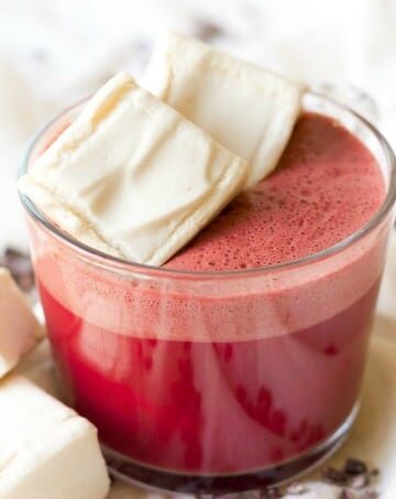 Healthy Sweet Beet Hot Chocolate is a fun twist on the traditional warming drink. This beautiful, deep pink and creamy nourishing drink is protein-rich, Paleo friendly, chocolaty and sweet with subtle earthy notes. | Recipes to Nourish