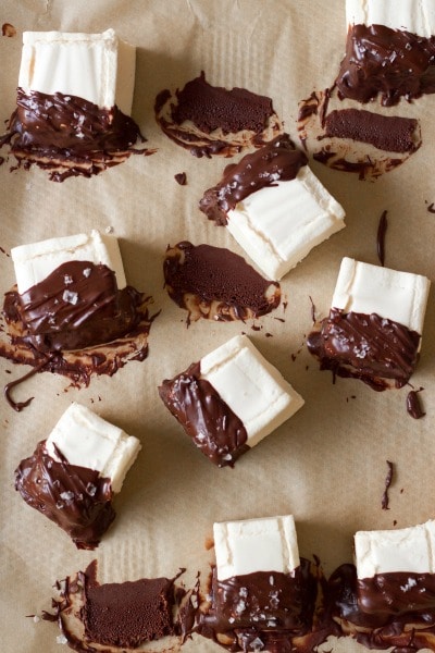 Homemade marshmallows dipped in chocolate and topped with flaked sea salt.