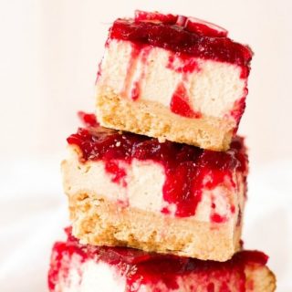 (ad) These Healthy Grain Free Cranberry Cheesecake Bars are so festive and perfect for the holidays! They're made with a homemade shortbread crust, protein-rich cheesecake center and topped with a naturally sweetened cranberry sauce. | Recipes to Nourish