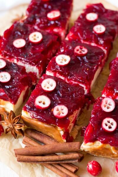 Slices of cranberry cheesecake bars. 