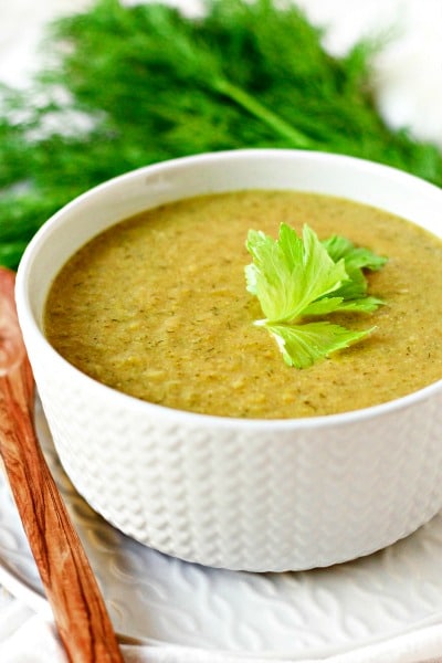 Broccoli soup in a bowl with fresh dill. 