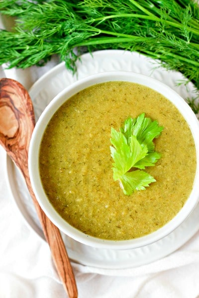 Broccoli soup in a bowl with fresh dill. 