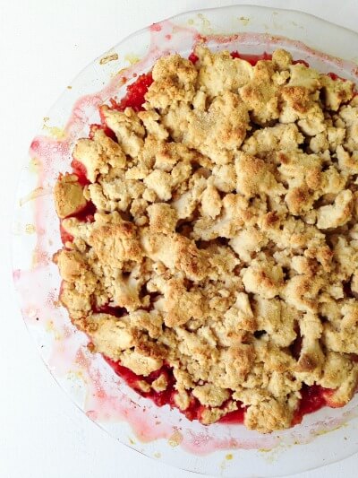 Strawberry rhubarb cobbler in a pie dish.