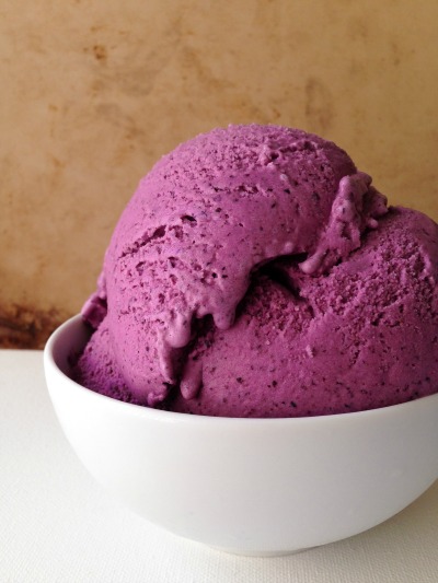 Big bowl of purple blueberry ice cream.