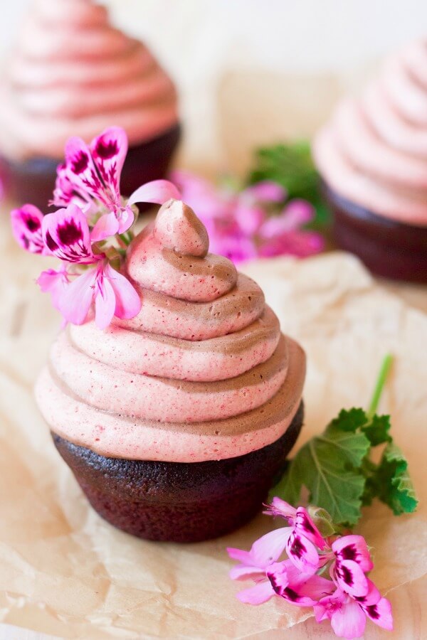 Chocolate raspberry swirl frosting on chocolate cupcakes.