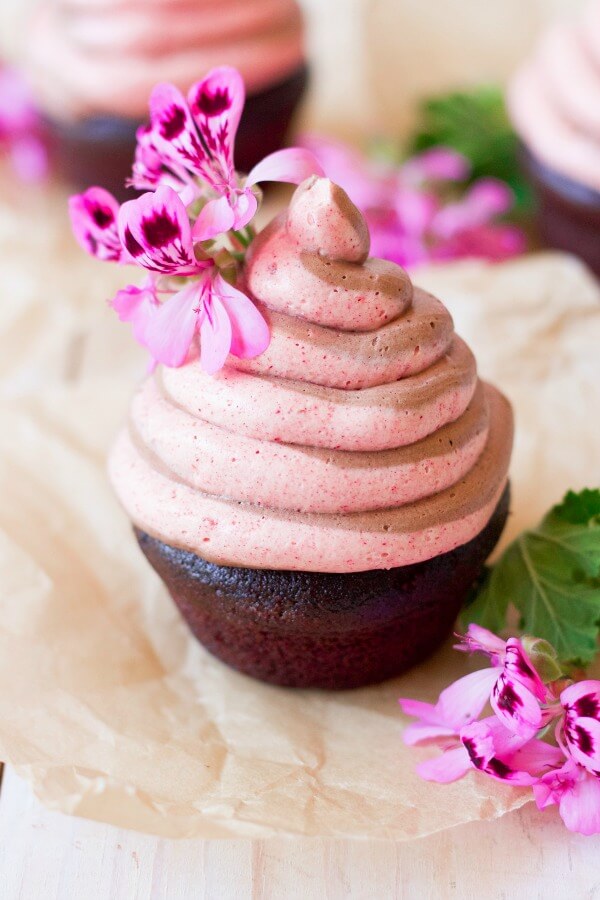 Chocolate raspberry swirl frosting on chocolate cupcakes.