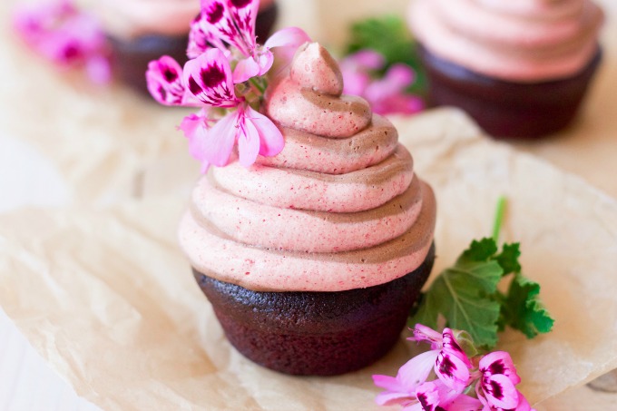 Chocolate raspberry swirl frosting on chocolate cupcakes.