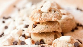 Stacked s'mores cookies with mini homemade marshmallows and chocolate chips.