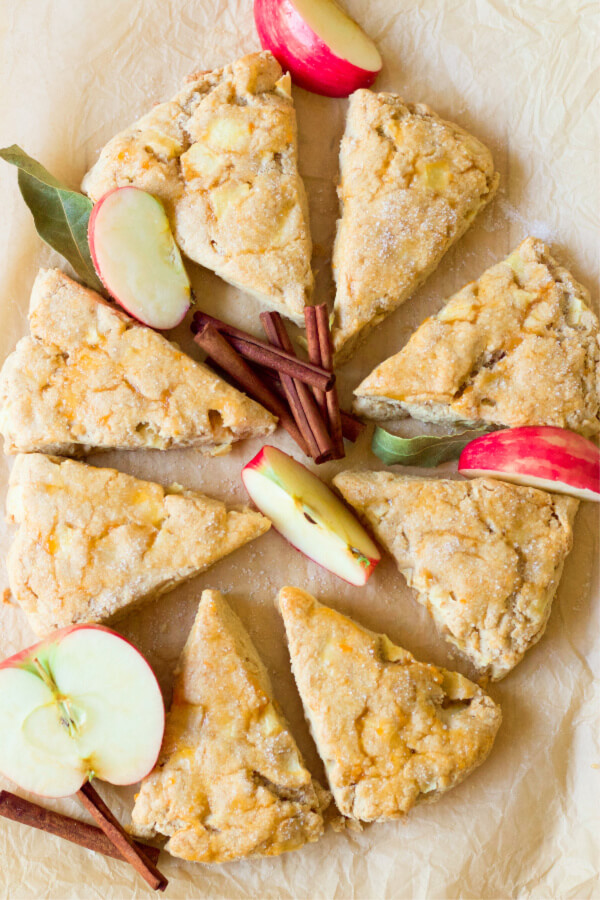 Apple scones with fresh apples and cinnamon sticks.
