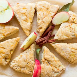 Apple scones with fresh apples and cinnamon sticks.