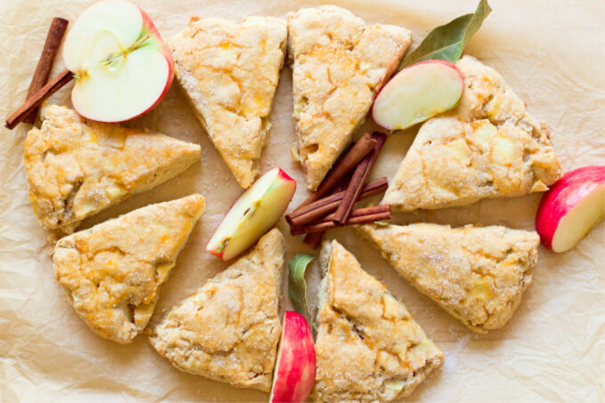 Apple scones with fresh apples and cinnamon sticks.