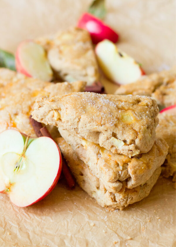 Apple scones with fresh apples and cinnamon sticks.