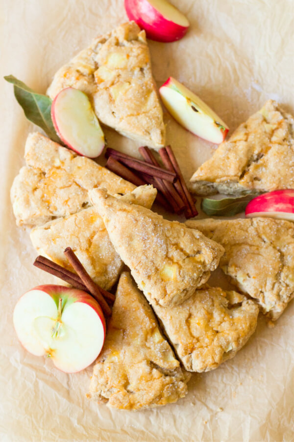 Apple scones with fresh apples and cinnamon sticks.