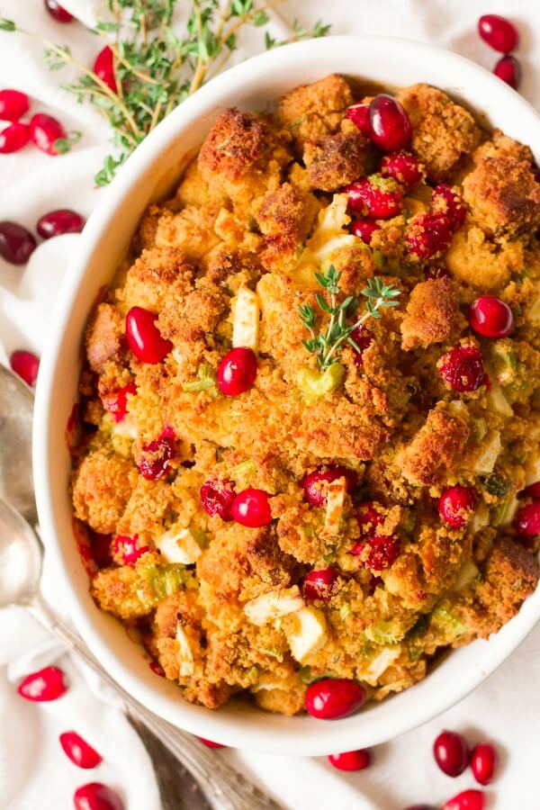 Cornbread stuffing with cranberries in a casserole dish.