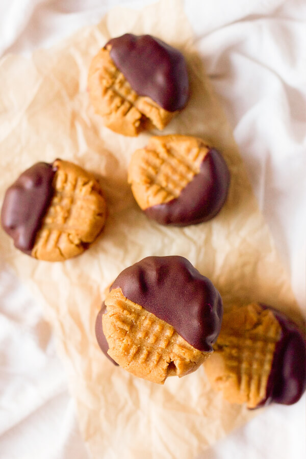 Peanut butter sandwich cookies half dipped in chocolate.