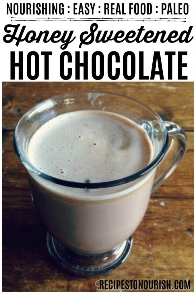 Glass mug full of homemade hot chocolate.