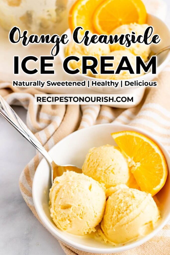 Bowl with scoops of orange ice cream, a spoon and fresh orange slices with text that says Orange Creamsicle Ice Cream.